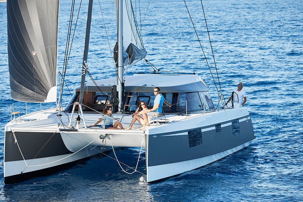 friends sailing on luxury sailboat