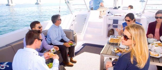 Friends having lunch on boat