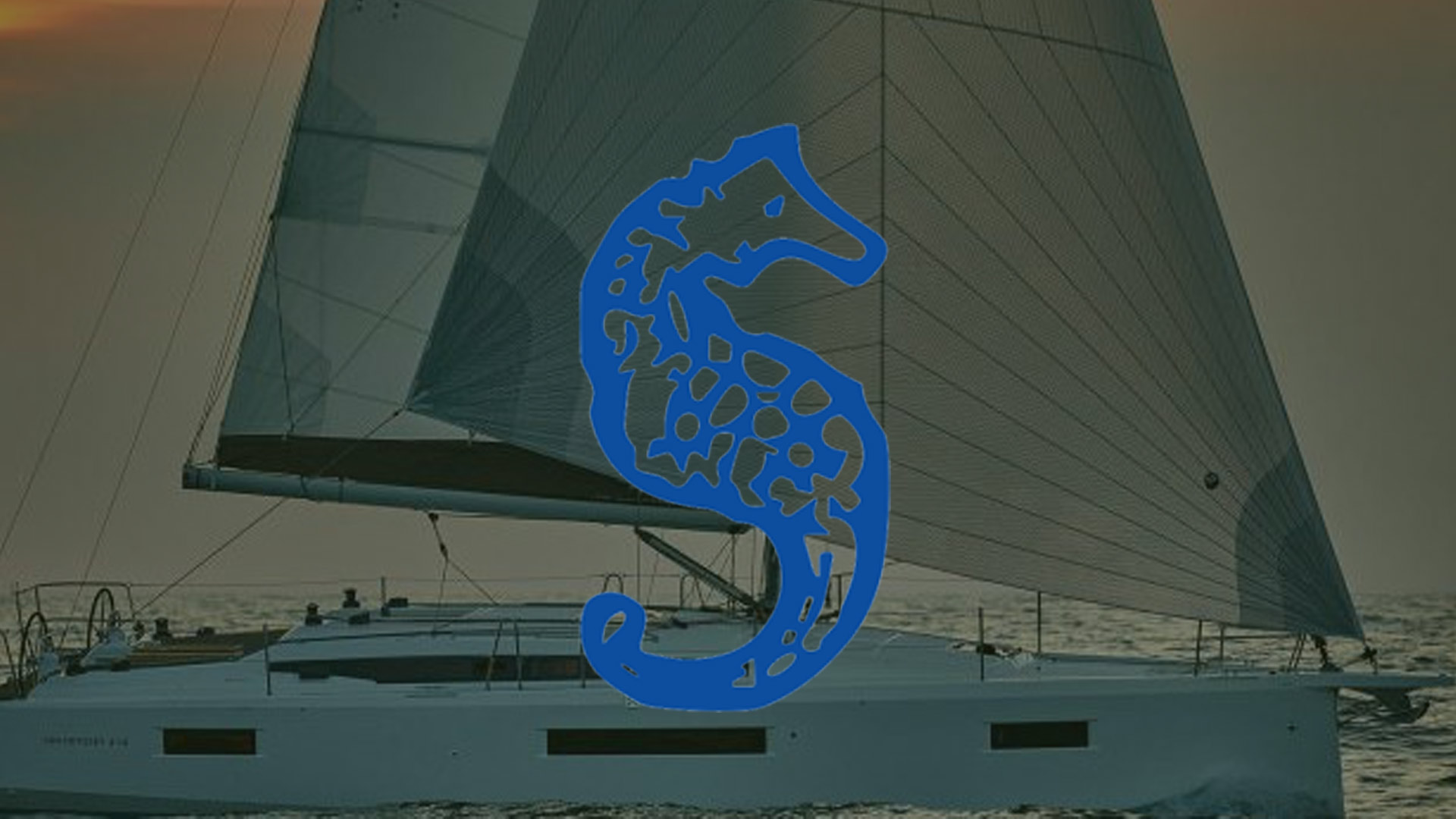 Sailboat on water with a blue scribble superimposed, obscuring part of the image.